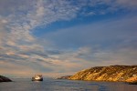 Fishing boat approaching Ilulissat harbor, West Greenland