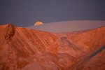 Full moon rising at the edge of the Greenland Ice Sheet where it has receded